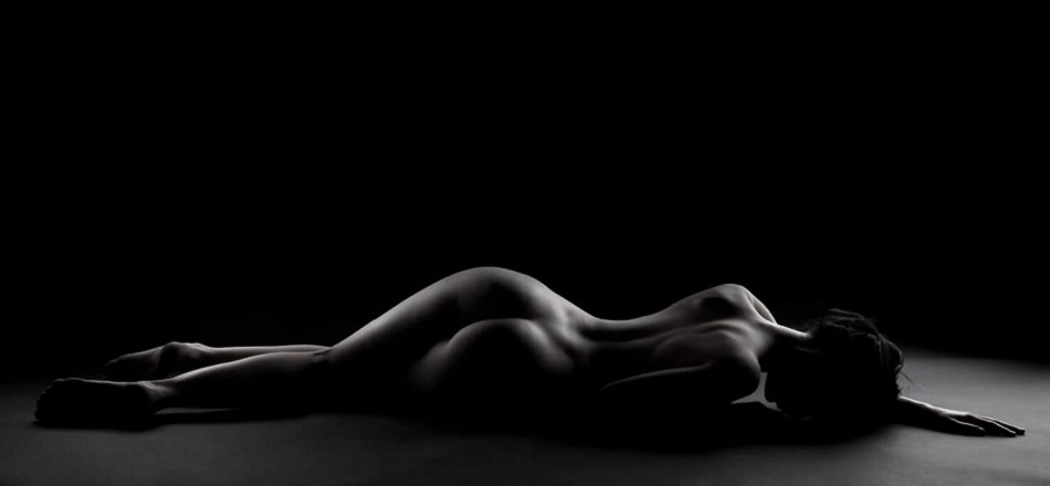 Black and White Nude Lying on Stomach Woman
