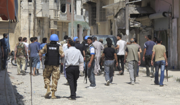UN suspends Syrian mission; tensions escalate